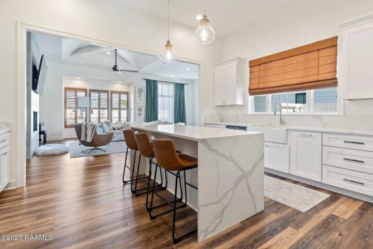 Contemporary Kitchen with Waterfall Quartz Island and Open-Concept Design